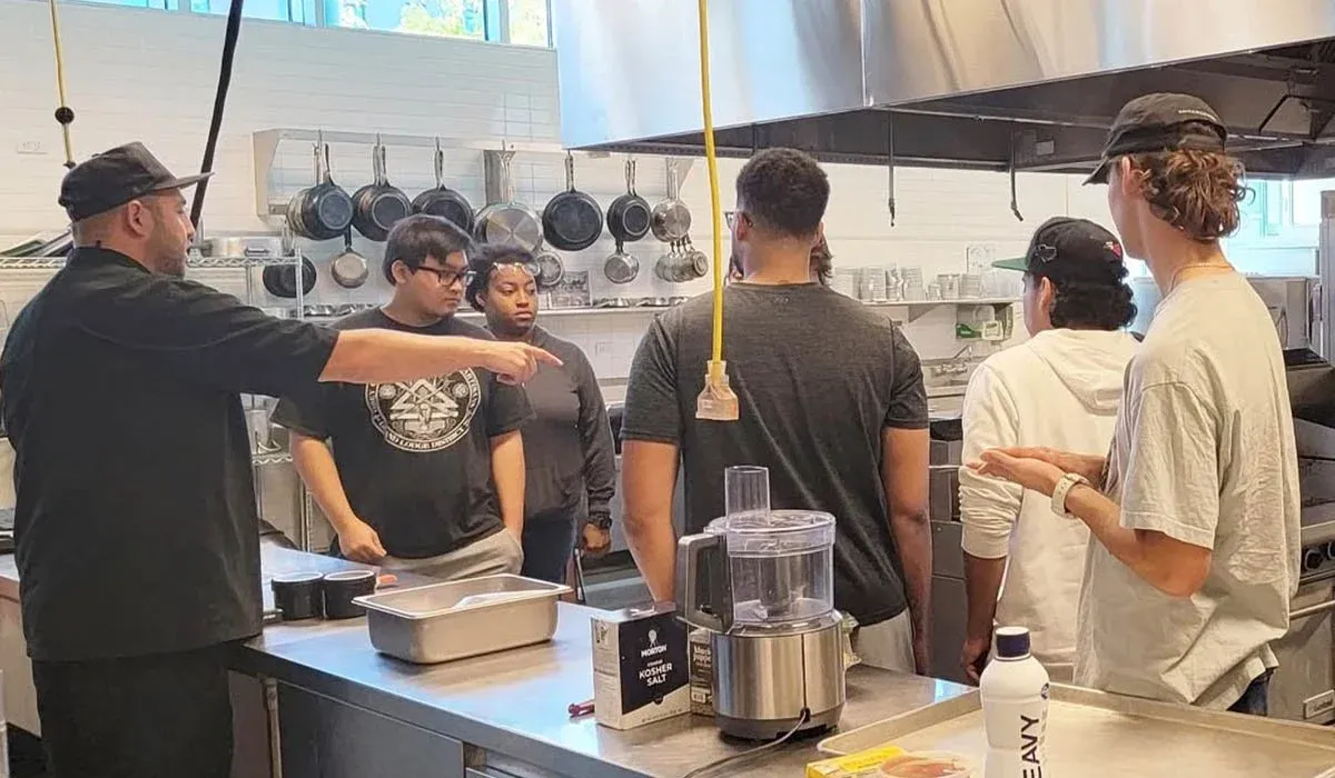 Chef Roilty teaching a cooking class at Metropolitan State University