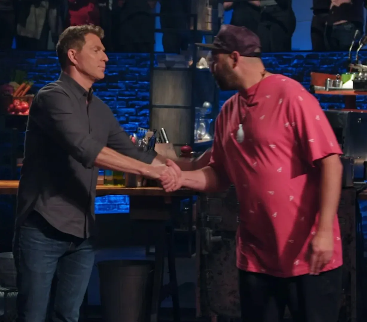 Chef Jarod Roilty Farina shaking hands with Bobby Flay on Beat Bobby Flay
